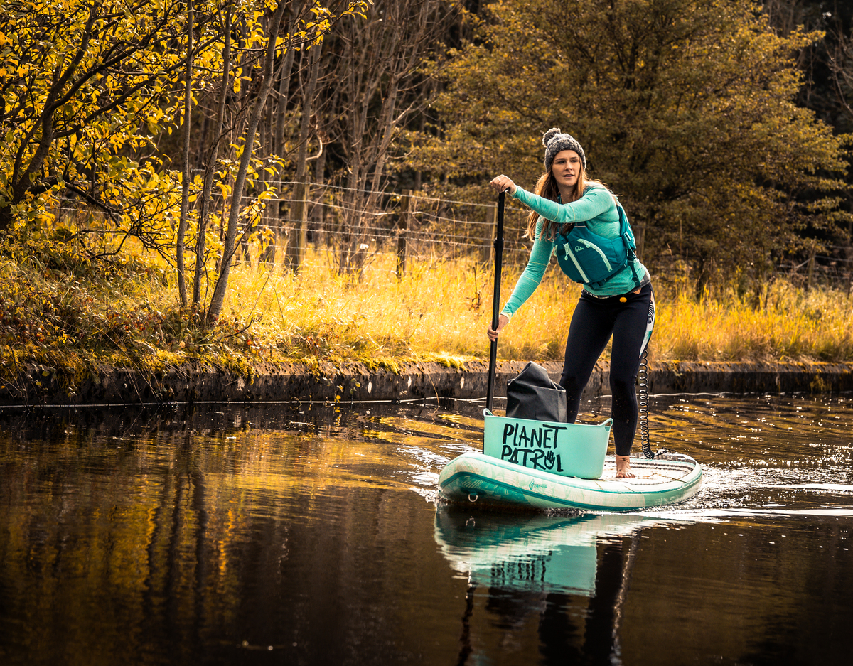 Planet Patrol’s Founder, Lizzie Carr, paddleboarding